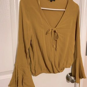 Gold or burnt yellow long sleeve bell top/blouse